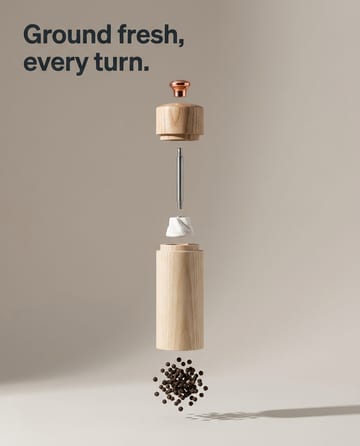 Exploded view: the parts of a wooden pepper mill