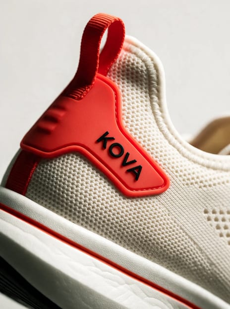 Macro of the heel counter wordmark and knit