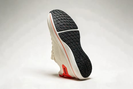 Running shoe outsole with a hexagon tread