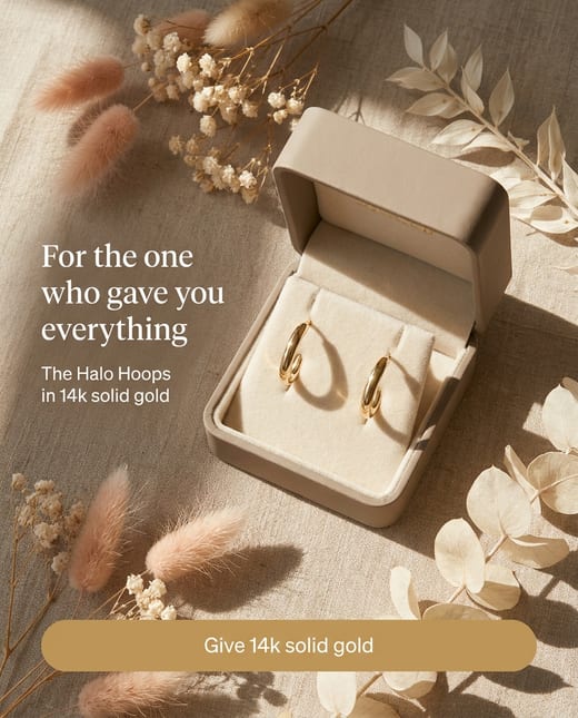 Mother's Day ad: gold hoop earrings in an open gift box