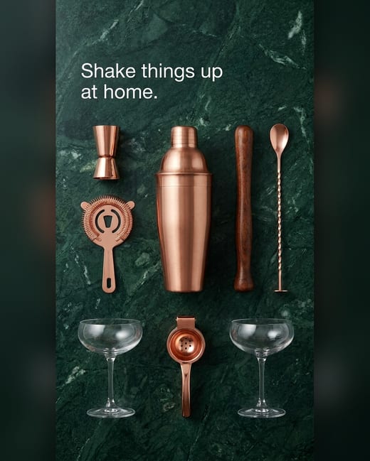 Knolling photo: a copper cocktail kit on green marble