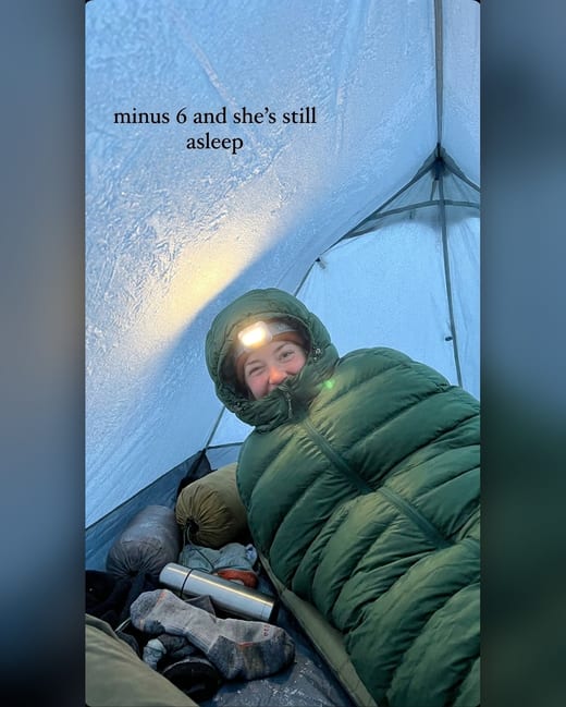 UGC photo: a woman waking up in a frosty tent at dawn
