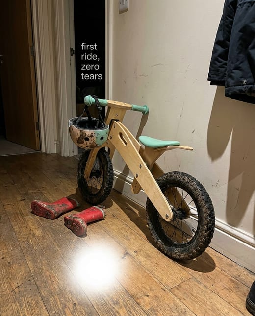UGC photo: a muddy kids' balance bike in a hallway