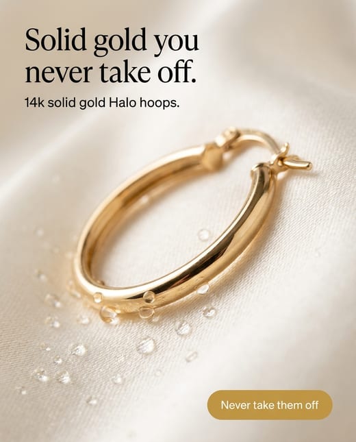 Macro shot of polished gold hoop earrings
