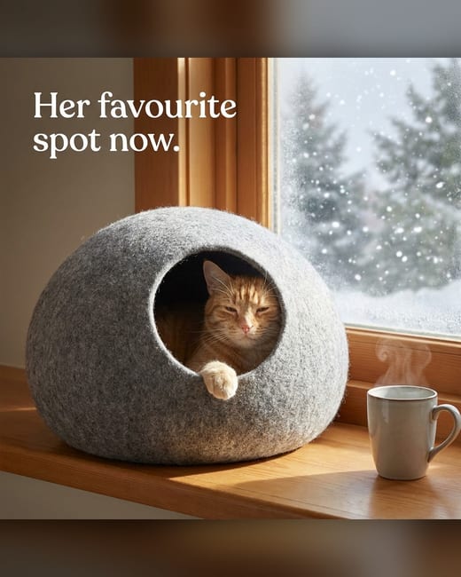 Lifestyle product photo: a ginger cat in a wool cat cave