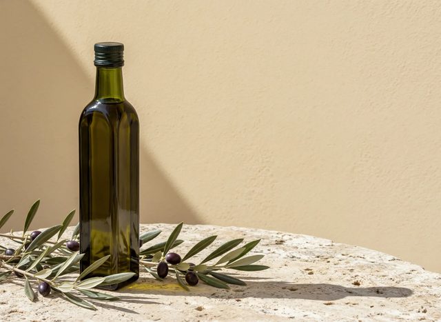 Olive oil and branch