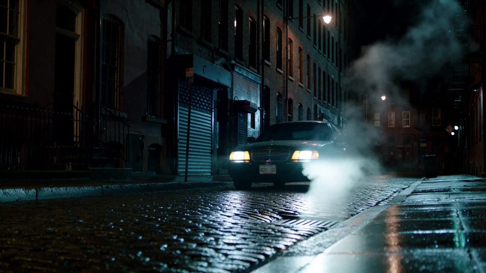 Headlights on wet stone